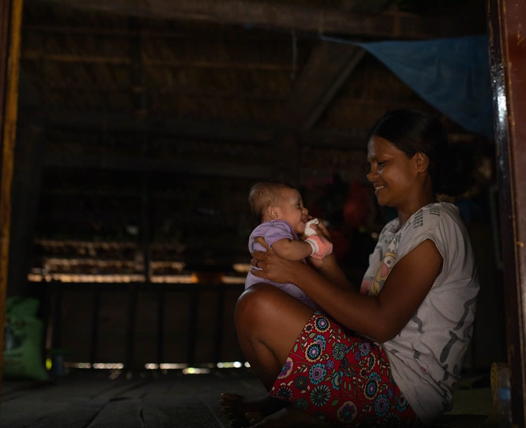 Woman holding a baby